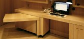 retracting automated desk opening
